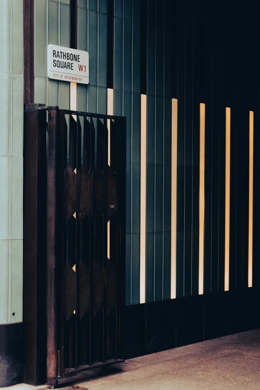 a closed door with a sign on it next to a building