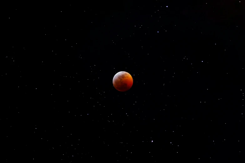 a partial view of the moon as it passes through the earth