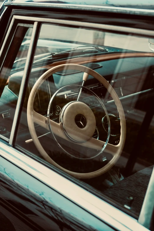 the dashboard on the old fashioned car is made