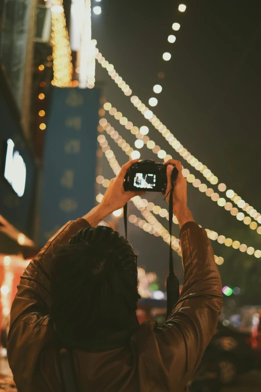 the man is taking a picture of himself taking pictures