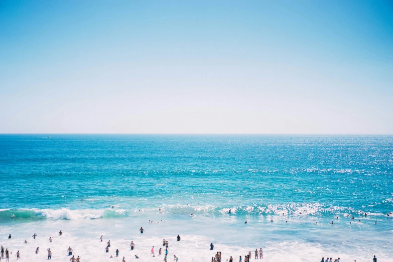 beach scene with several people on the shore