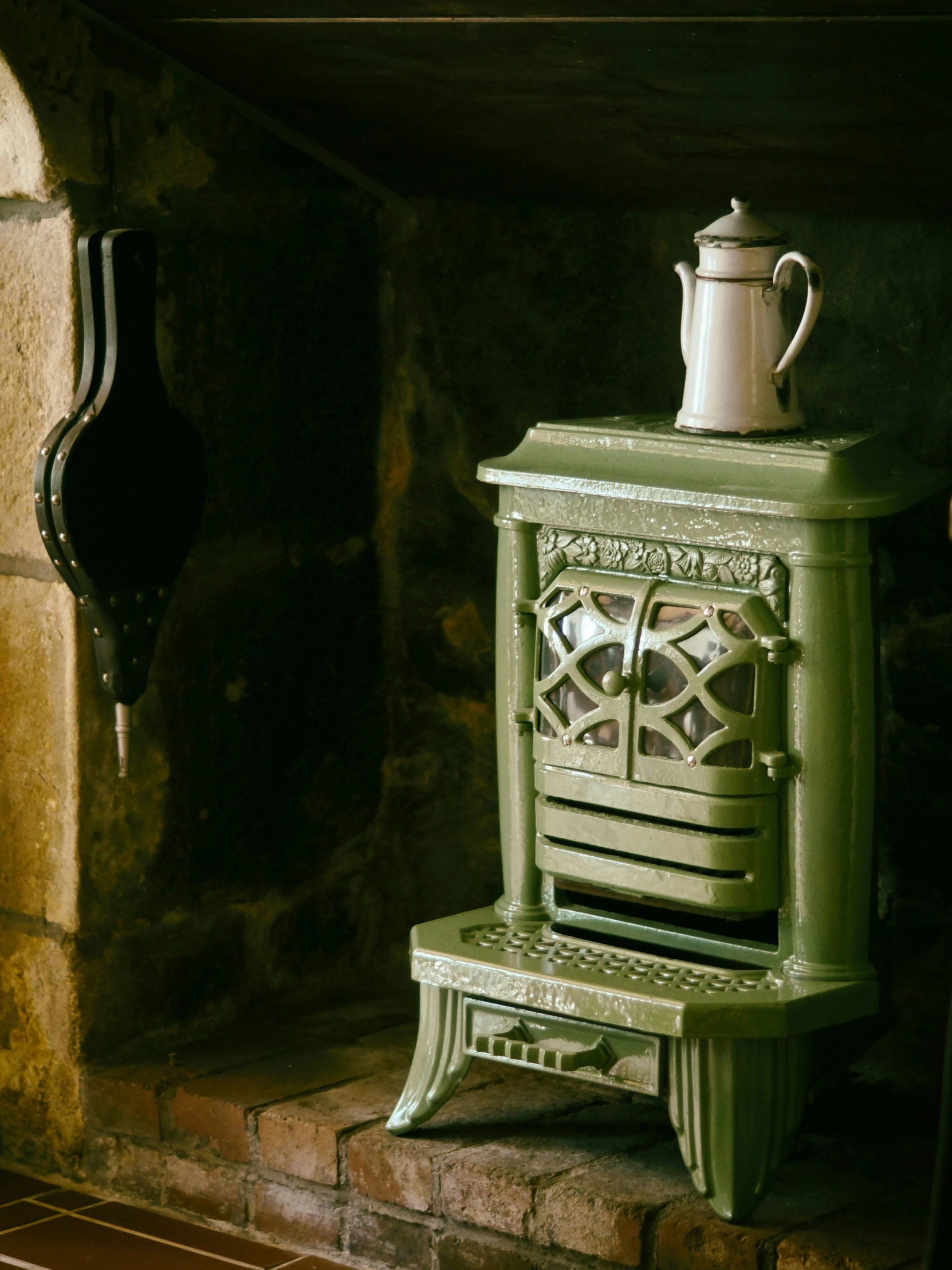 an old antique stove in the corner of a room