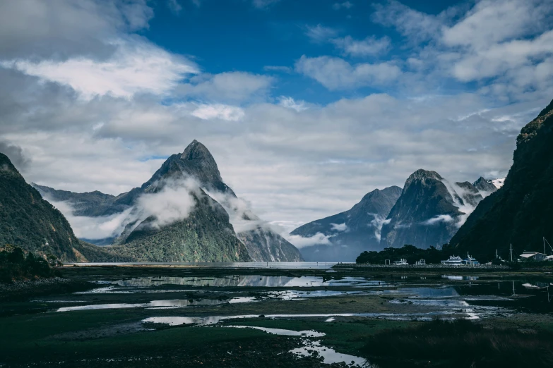 a large valley with mountains and water