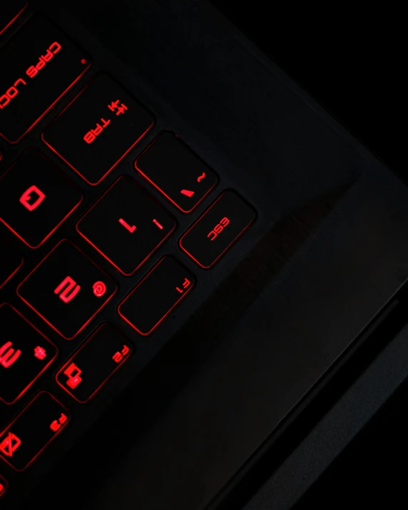 a red keyboard illuminated in the dark