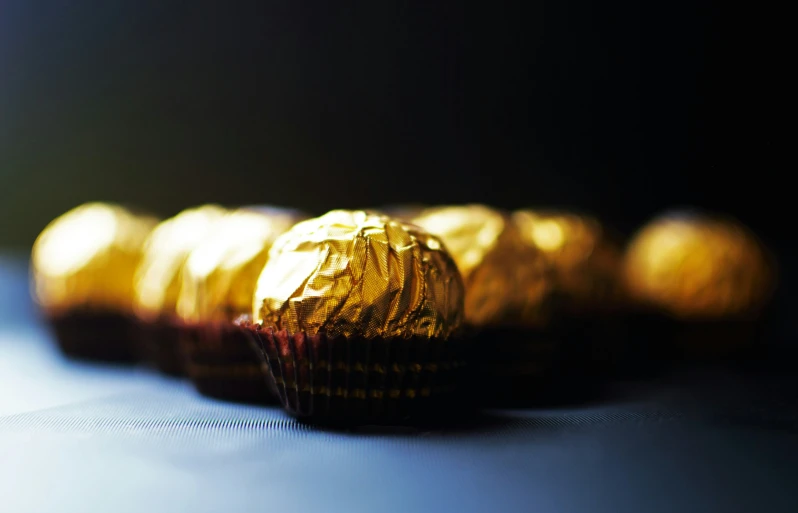 several chocolate covered cups sitting on top of a counter