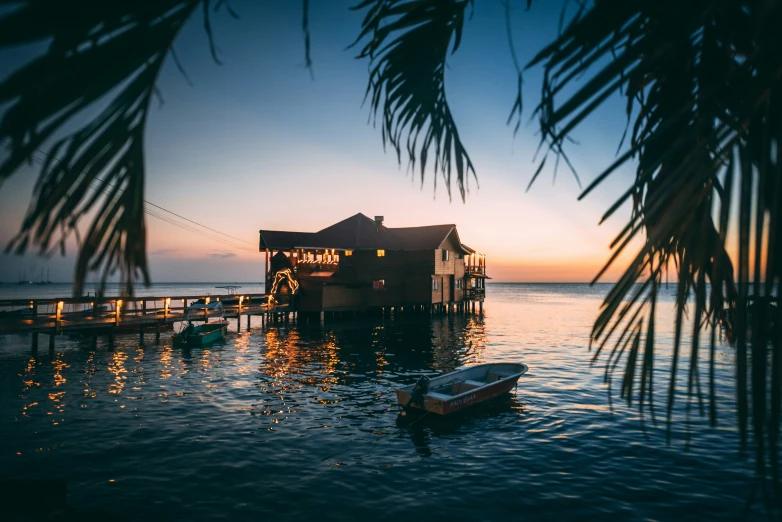 an open air jetty next to the sea at dusk