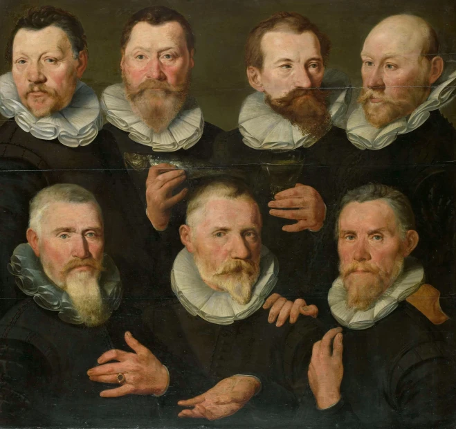 several men and a woman by a man with a beard
