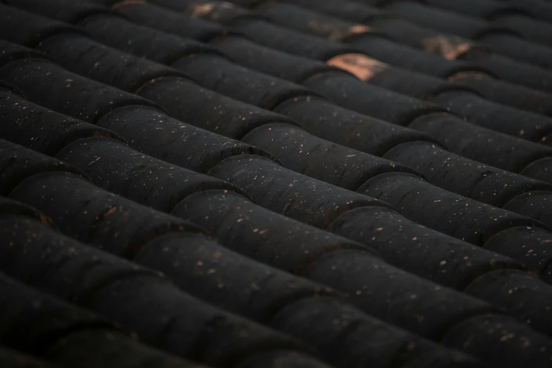 black colored tiles with dots on them in close up