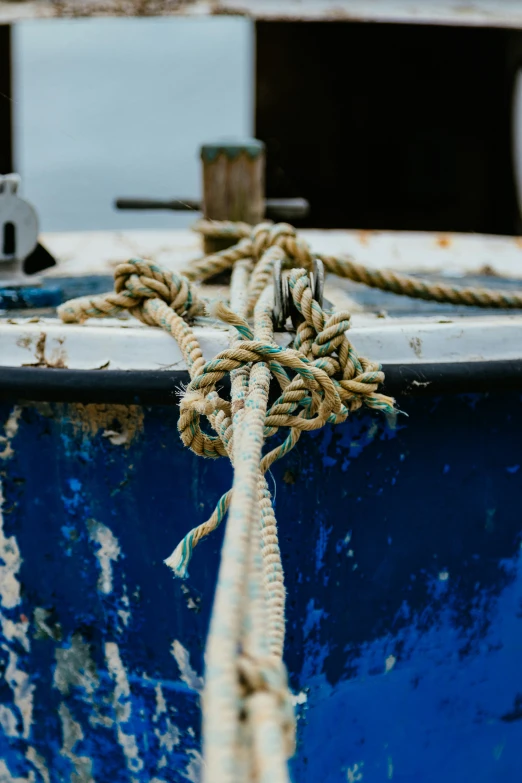 a close up of the rope of an old boat