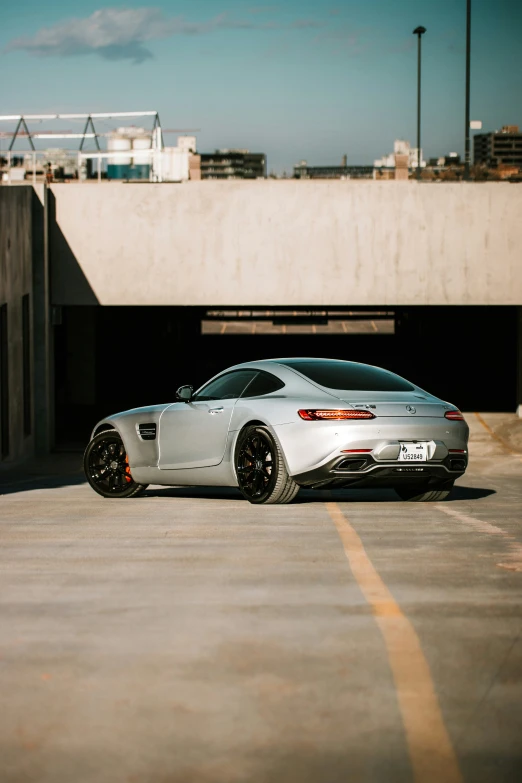 a sports car parked in a parking garage