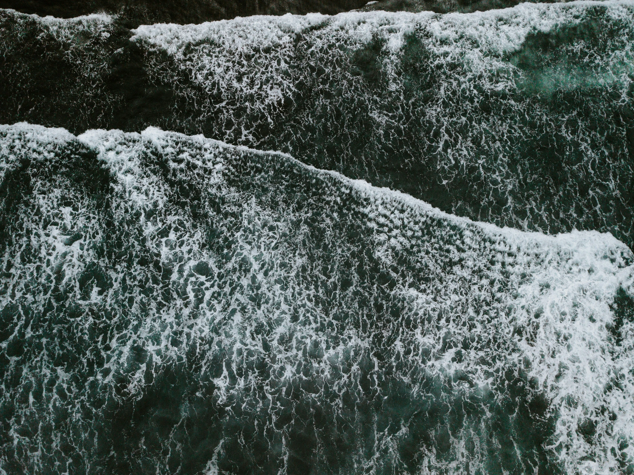 close up view of an ocean wave in the water