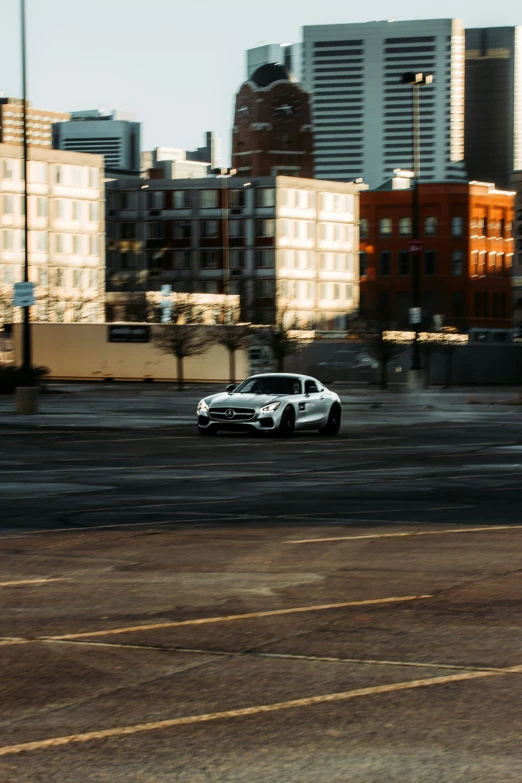 a car is sitting in an empty parking lot