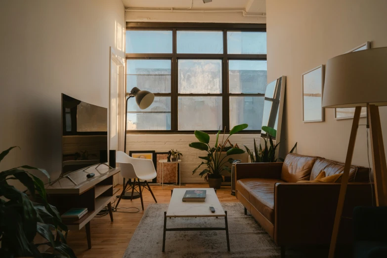 a living room with a very big big window