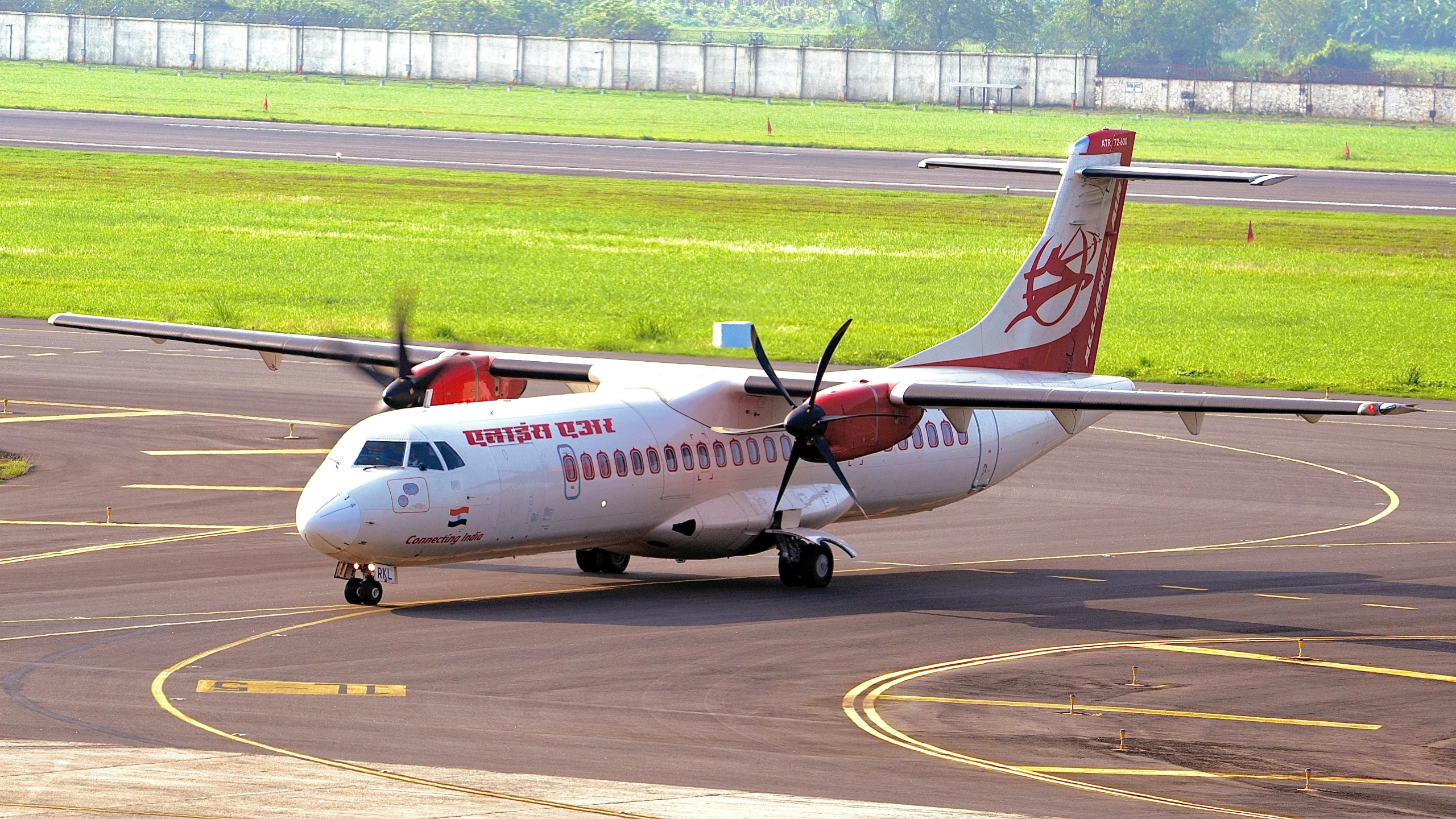 a small plane is sitting on the runway