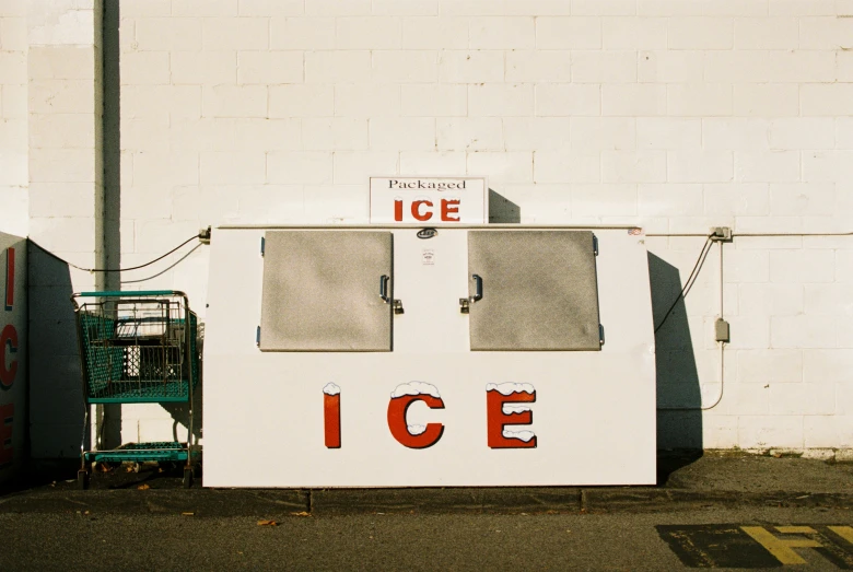 a ice stand sits on the side of the road