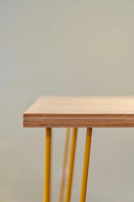 a table with some yellow wires in it