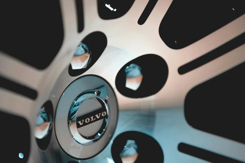 a car wheel on display at an automobile show