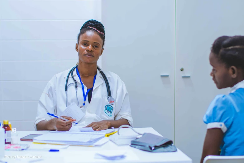 two doctors having meeting in an exam room