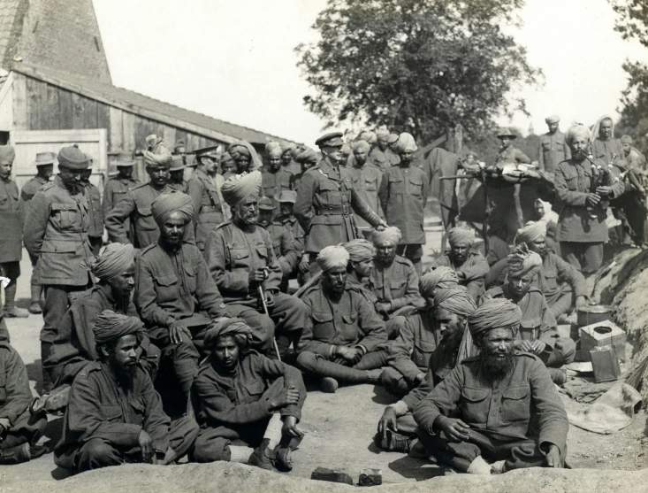 this group of people are posing for a pograph in front of a tent