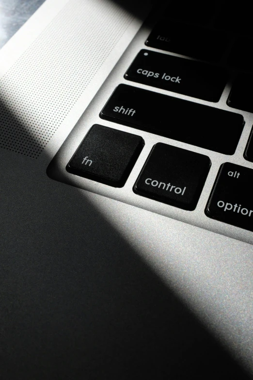 the light on a computer keyboard casts a shadow