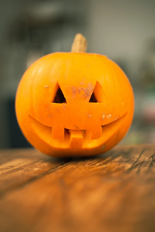 this pumpkin is carved into the shape of a jack - o - lantern