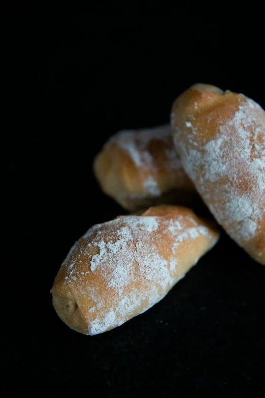 fresh baked food item displayed on black background