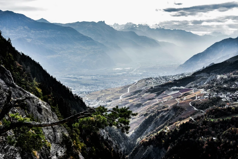 the mountains are covered with valleys and trees