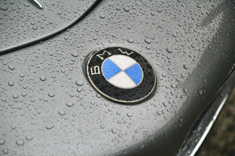 a close up of the hood emblem on a car