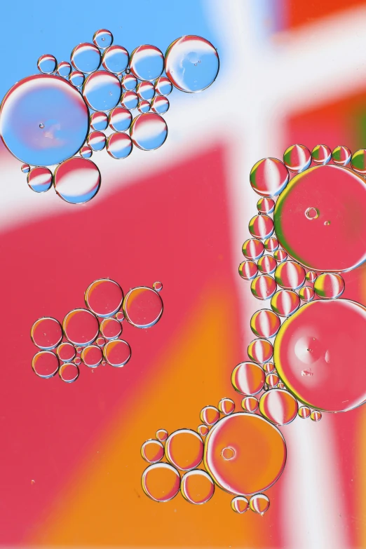 oil painting of pink bubbles with green drops