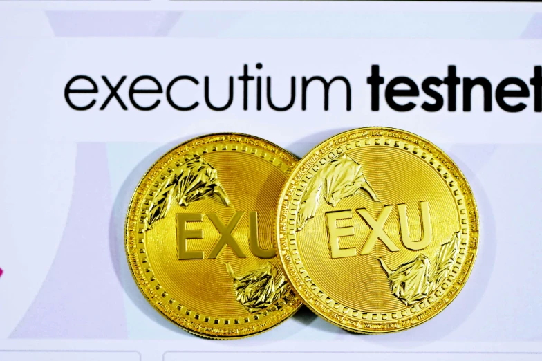 two gold coin from mexico with the name exu written on them