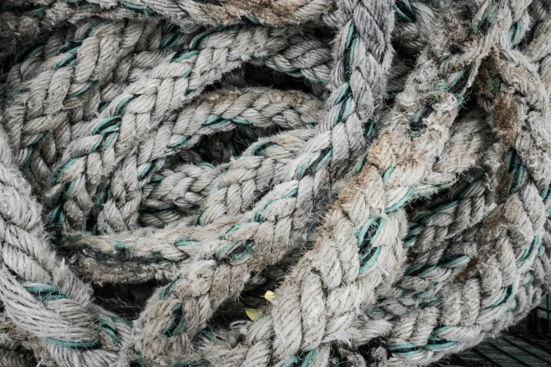 the texture of some grey and green yarn