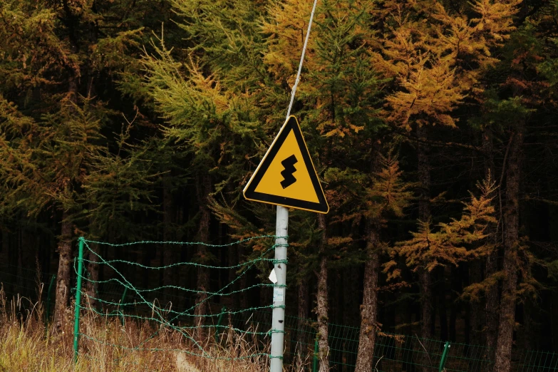 a sign warning motorists to be careful of an overtaking road