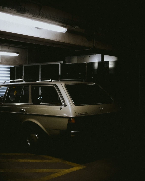 a white van that is parked under some lights