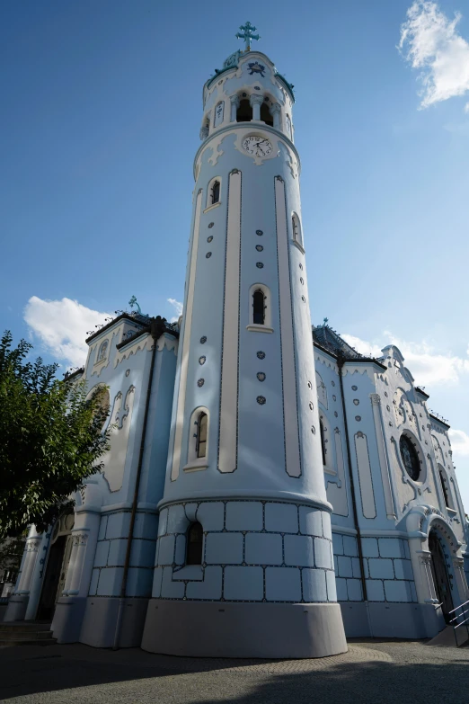 a building that has clocks on the top