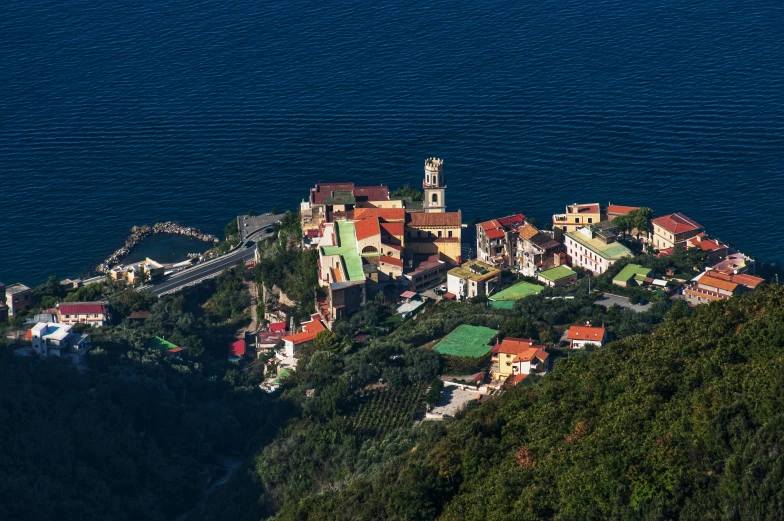 an image of a small town perched on the edge of a cliff