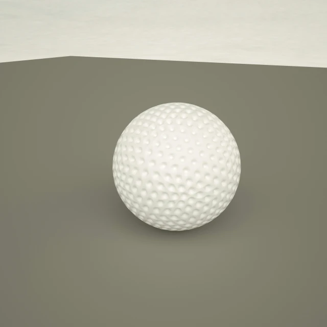 the white ball on the gray surface is a unique, decorative object