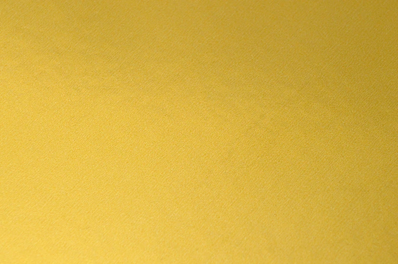 a yellow paper background with little dots