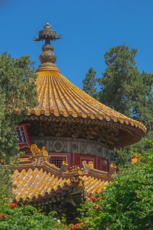 some kind of pavilion in a garden with a dome on top