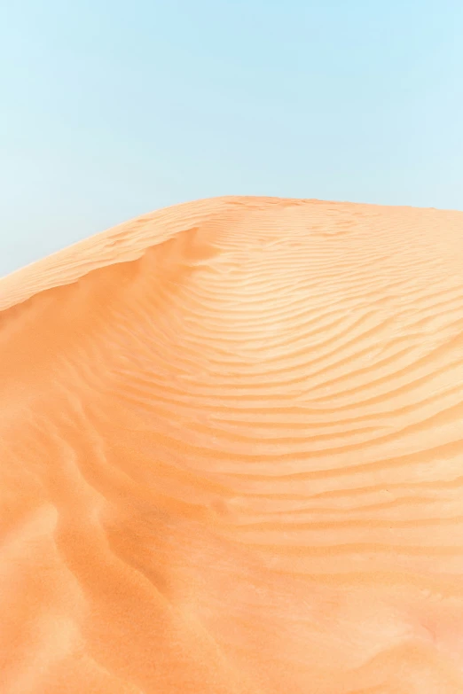 a po of a sandy desert under a blue sky