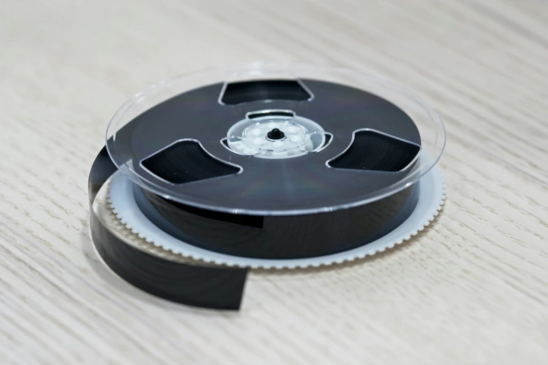 the spools are attached to a disc on a table