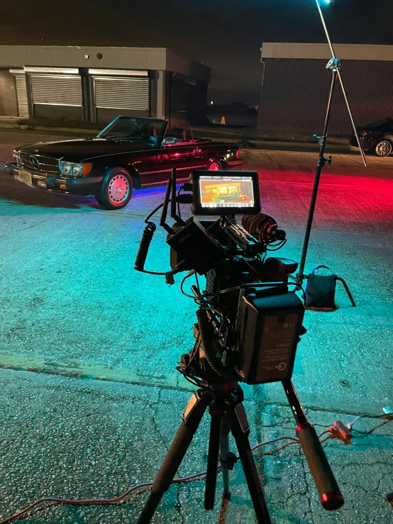 a vehicle in the parking lot behind a camera