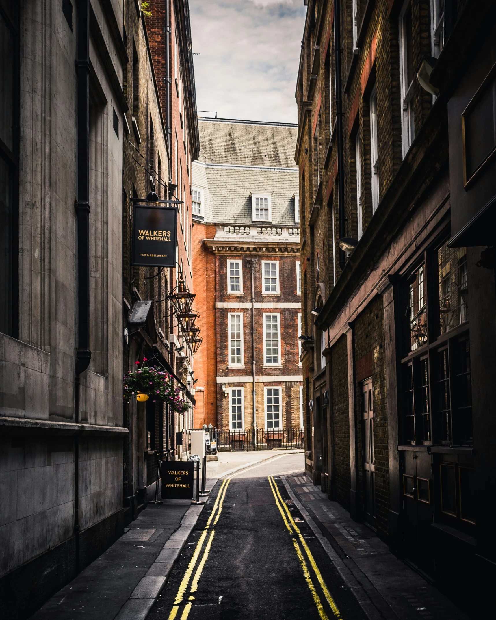 a narrow road that looks like a deserted street