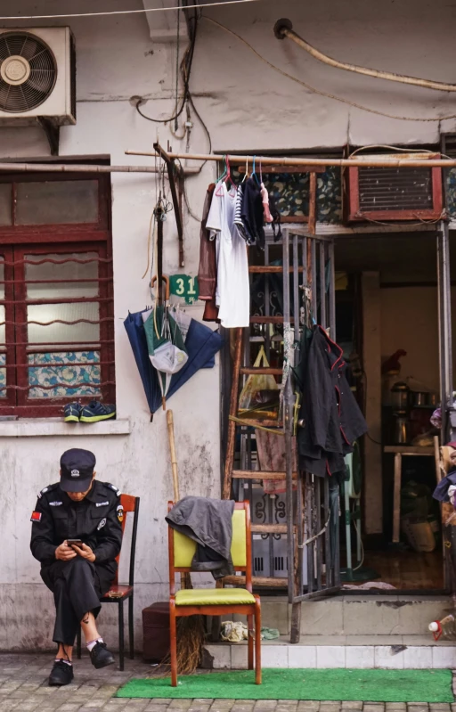 there is a police officer standing by a store