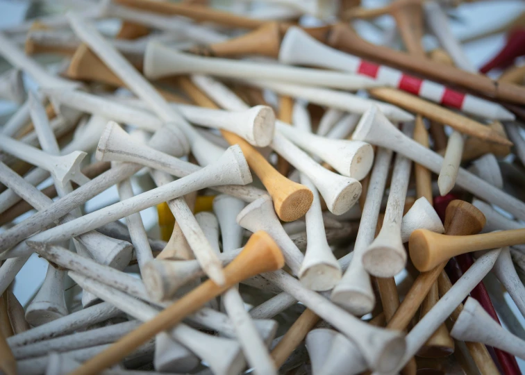 a pile of matches are arranged together in rows