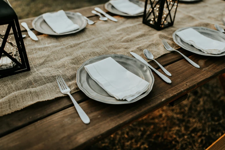 a table setting with place settings for two people