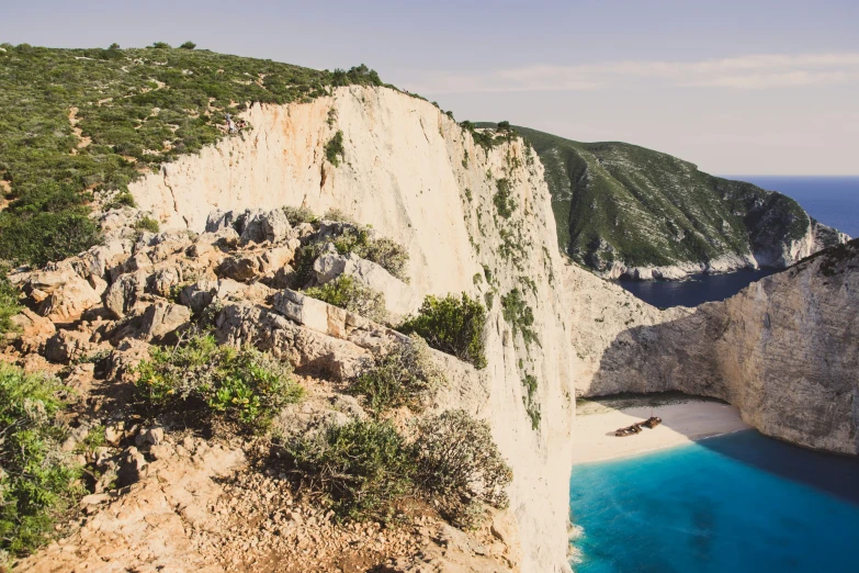 there is a boat that is going up the cliff