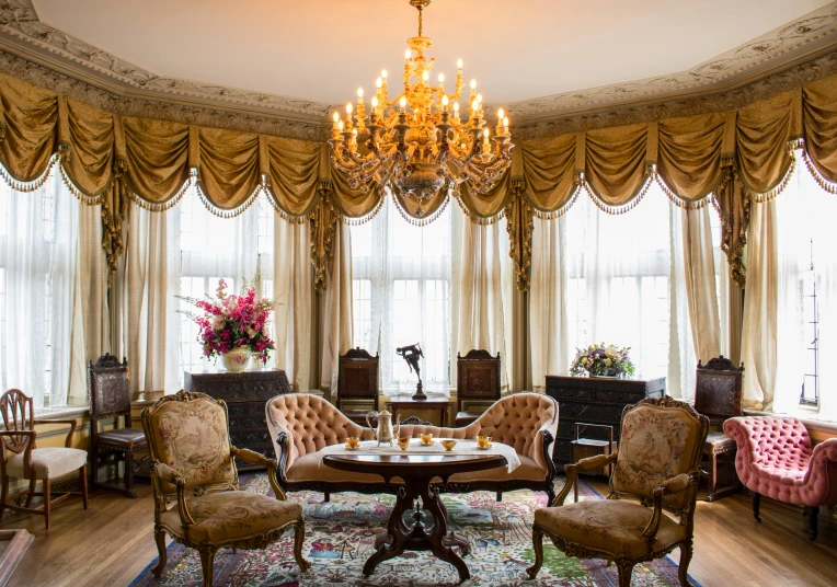 ornately decorated sitting area with several chairs