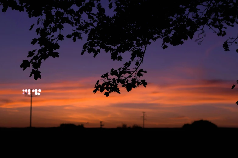 the evening sky with a bright red glow in it