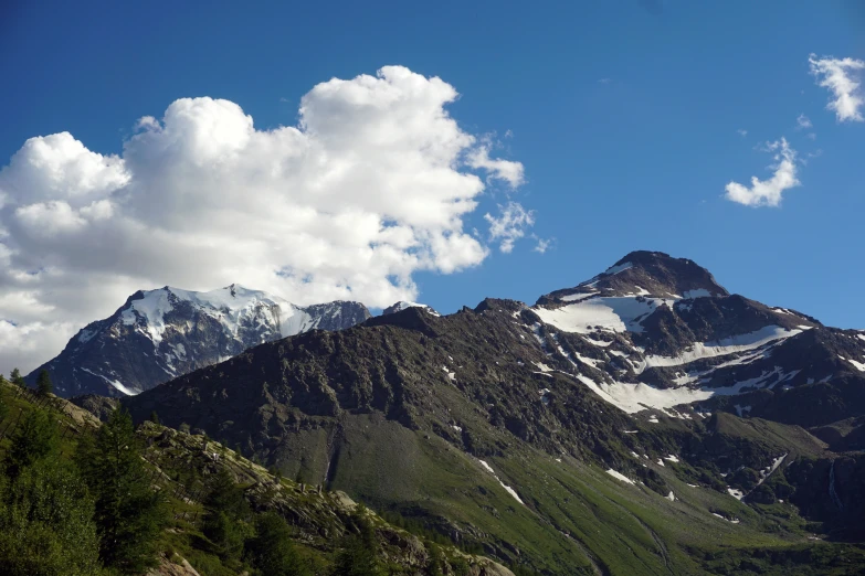 a big mountain that has some snow on it