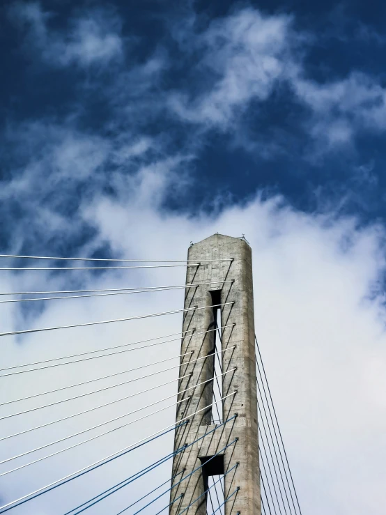 a tall building sitting on top of a bridge